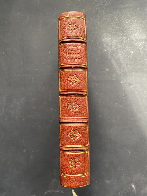 A 19th-century novel by Louis Ulbach in a handsome decorated grosgrain binding, dedicated by the author.