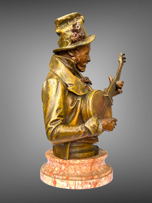 PIETRO CALVI 1833 - 1884 "THE MINSTREL" MAN PLAYING THE BANJO IN PATINATED STONEWARE