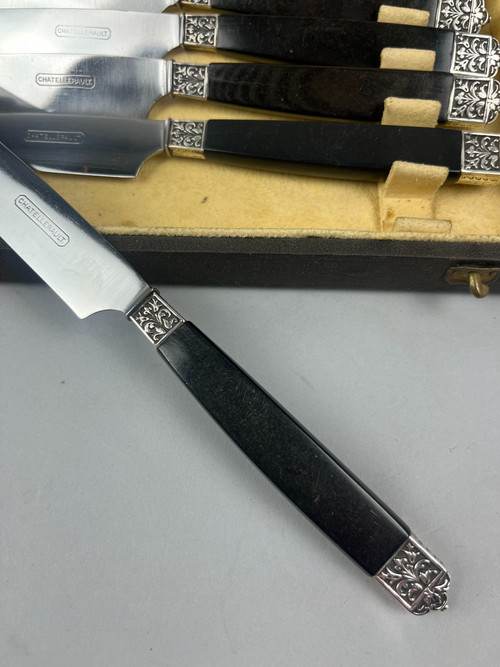 12 Table knives ebony handle silver ferrule