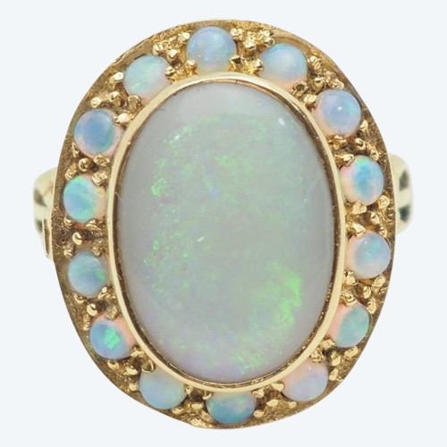 Old ring in yellow gold and opal cabochon