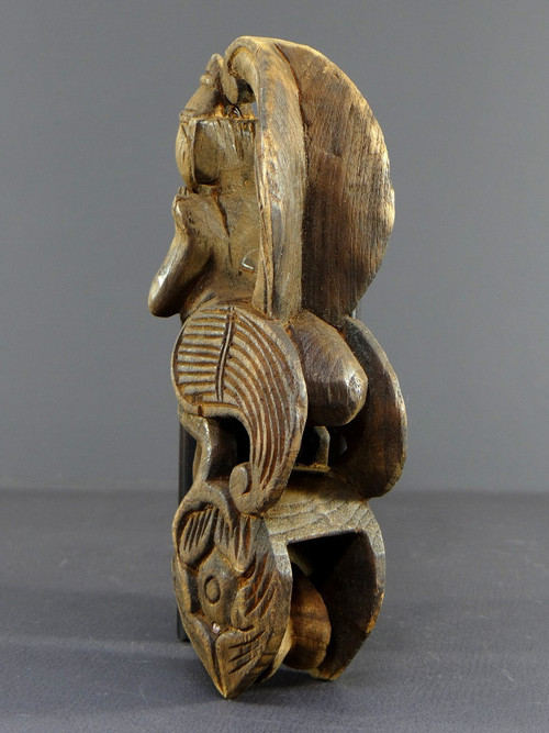 Burma, Mid-20th Century, Carved Weaving Loom Pulley Depicting a Nat (or Nak).