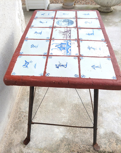 Iron coffee table from the 60's with 19th century Delft tile top