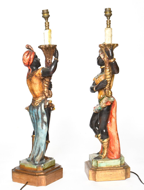 Pair of lamps in carved polychrome and gilded wood with Nubian décor