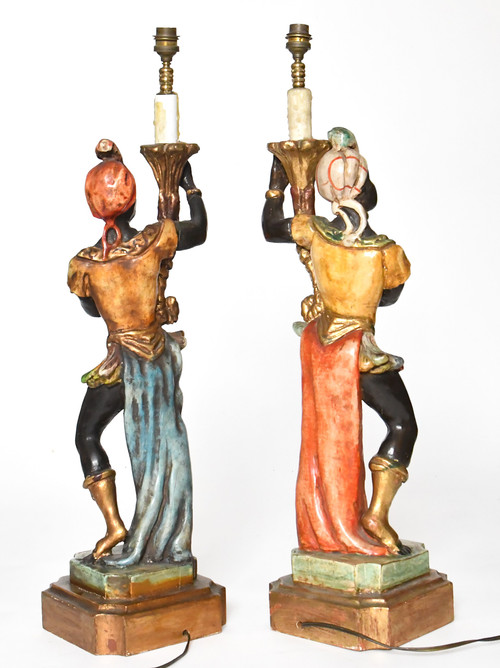 Pair of lamps in carved polychrome and gilded wood with Nubian décor