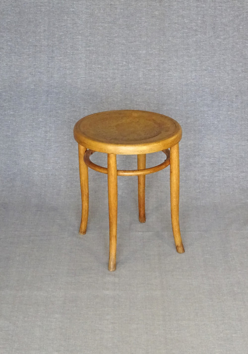 Low blond bistro stool, circa 1920, wooden seat