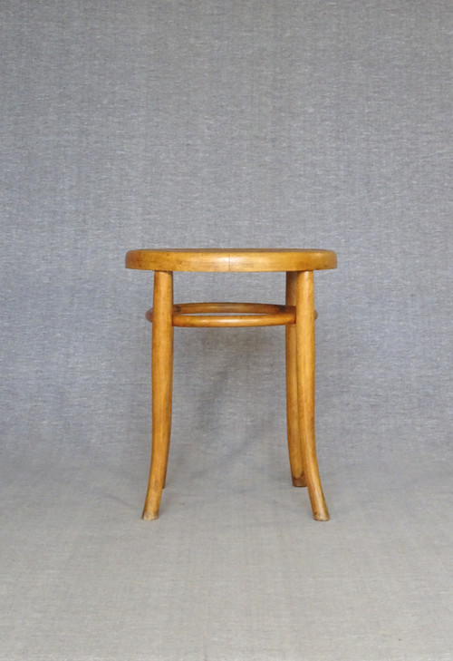 Low blond bistro stool, circa 1920, wooden seat