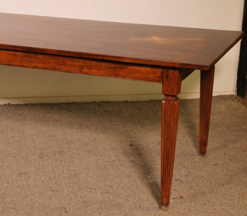 19th Century Cherry Wood Refectory Table With Louis XVI Caneled Legs