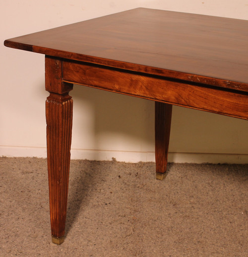 19th Century Cherry Wood Refectory Table With Louis XVI Caneled Legs