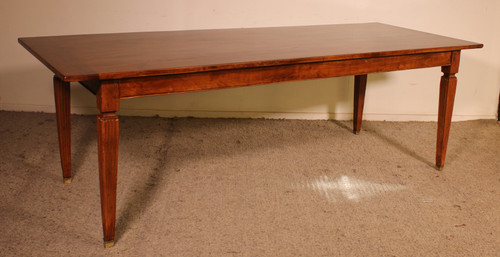 19th Century Cherry Wood Refectory Table With Louis XVI Caneled Legs