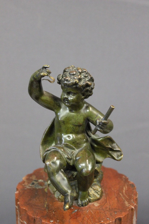 Orologio a baldacchino sormontato da un putti 1880 ca.