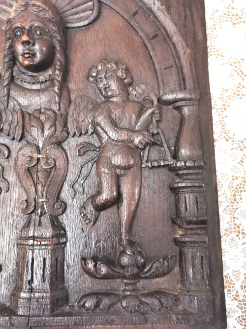 Oak panel carved with a Virgin between two Musician Angels 17th