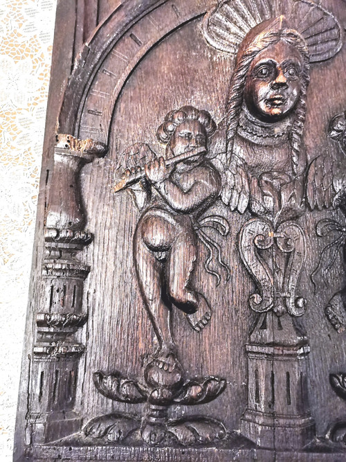 Oak panel carved with a Virgin between two Musician Angels 17th