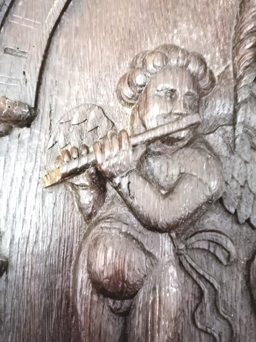 Oak panel carved with a Virgin between two Musician Angels 17th