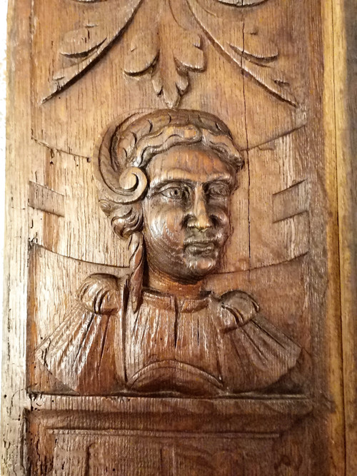 2 17th century carved oak panels representing man and woman