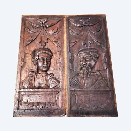 2 17th century carved oak panels representing man and woman