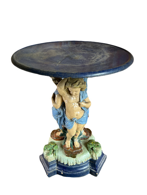 Centerpiece decorative tray decorated with putti in slip