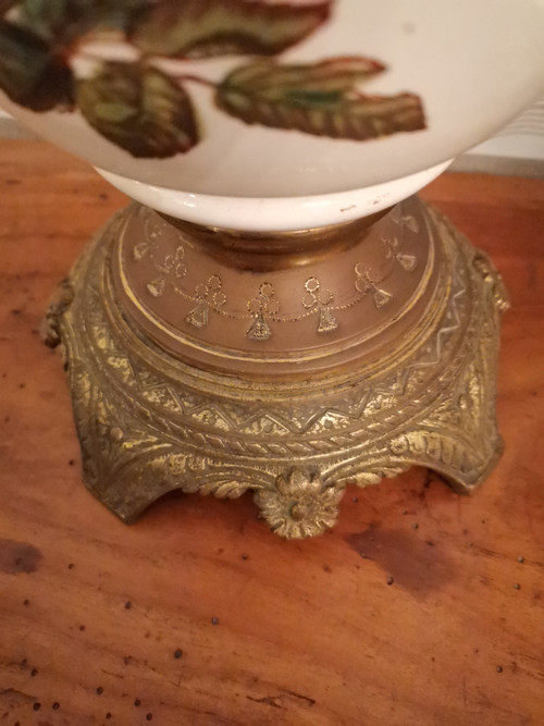 Pair of earthenware oil lamps with pink flower decoration, 19th century