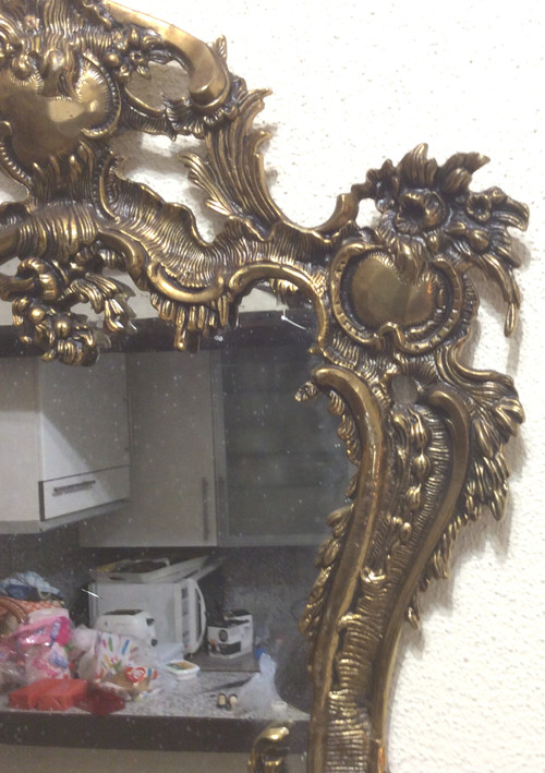 Louis XV style gilt bronze contour mirror