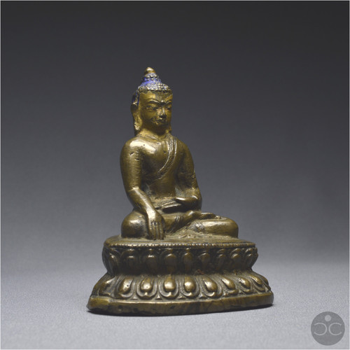 Tibet occidental, XIIIème-XIVème siècle, Représentation de Bouddha en bronze à patine brune 