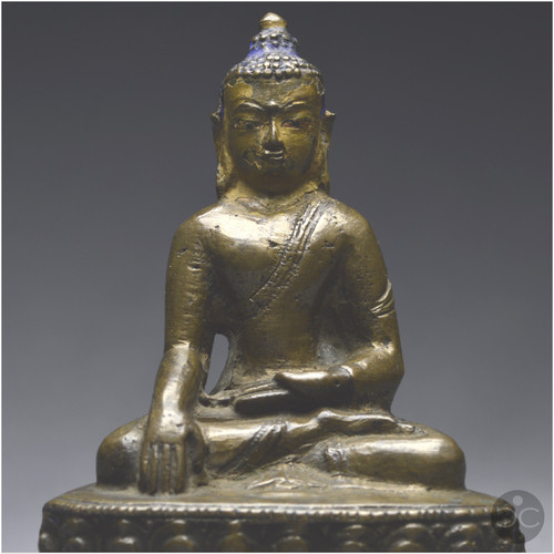 Tibet occidental, XIIIème-XIVème siècle, Représentation de Bouddha en bronze à patine brune 