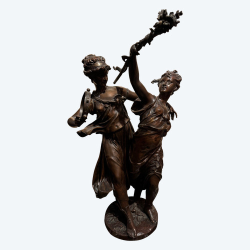 "Due musiciste", bronzo con patina di medaglia firmato DUMAIGE, 1880 ca.