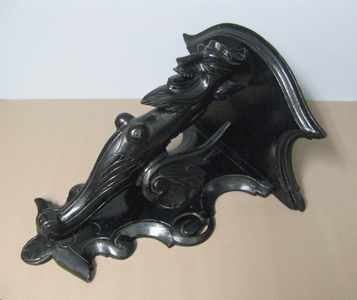 Carved Wood Devil's Head Sconce.