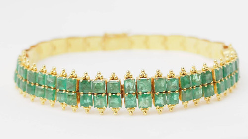 Antique flexible bracelet in yellow gold and emeralds