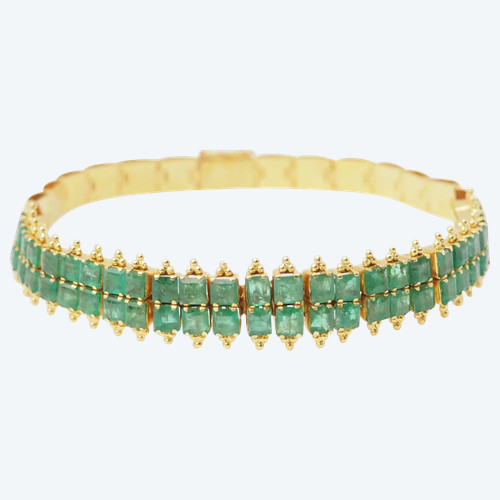 Antique flexible bracelet in yellow gold and emeralds