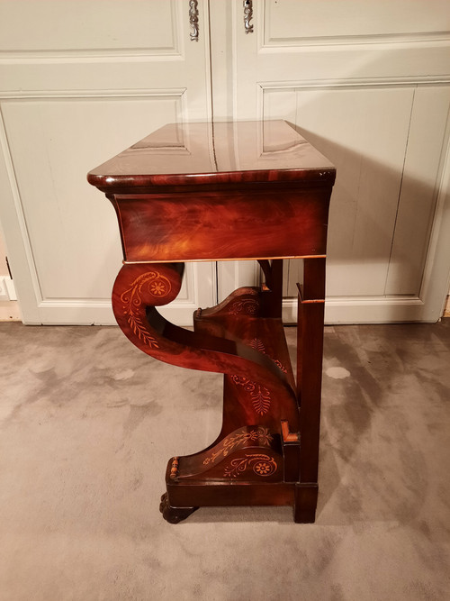 Charles X period console in mahogany and sycamore.