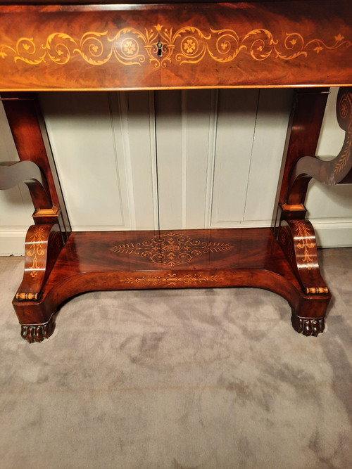 Charles X period console in mahogany and sycamore.