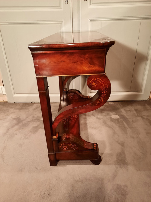 Charles X period console in mahogany and sycamore.