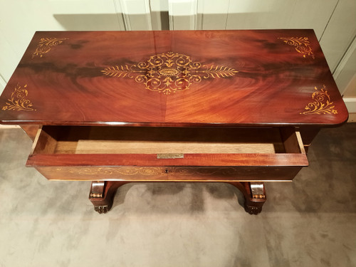 Charles X period console in mahogany and sycamore.