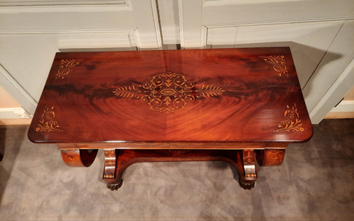 Charles X period console in mahogany and sycamore.