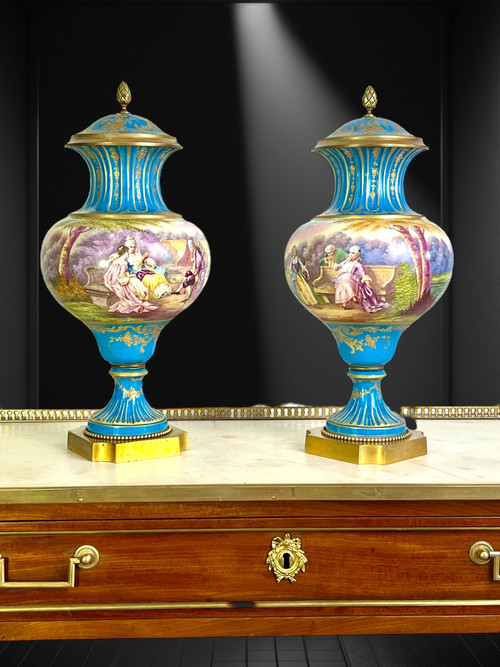 PAIR OF 19TH CENTURY VASES IN SÈVRES PORCELAIN DECORATED WITH GALLANT SCENES