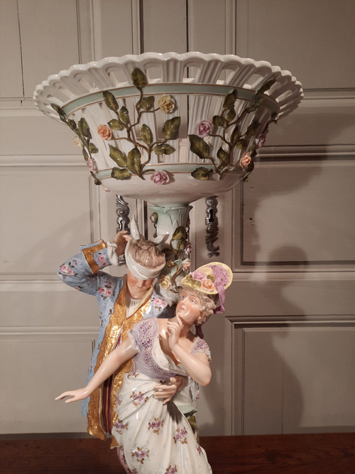 Porcelain group representing two 20th century figures.