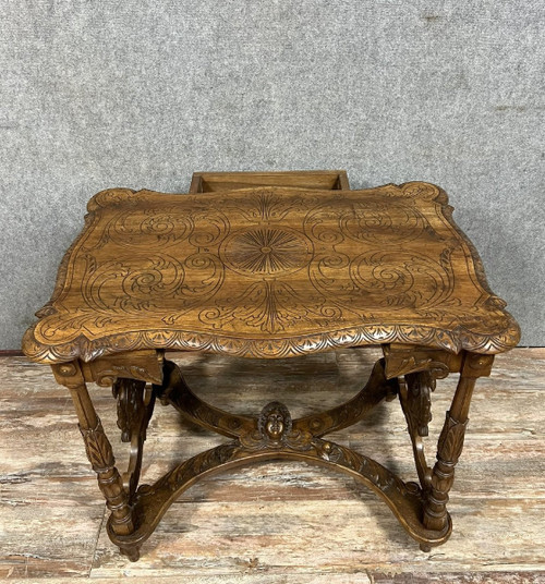 double-sided Renaissance desk in walnut carved with plant motifs