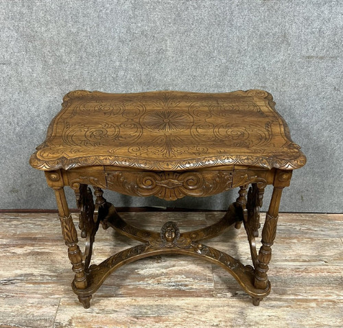 double-sided Renaissance desk in walnut carved with plant motifs