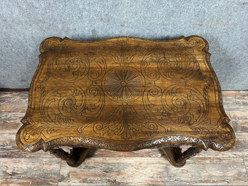 double-sided Renaissance desk in walnut carved with plant motifs