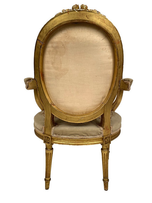 Louis XVI style giltwood armchair, late 19th or early 20th century