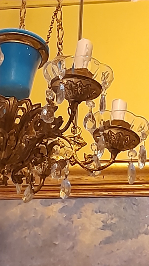 Brass alcove chandelier and blue opaline bowl