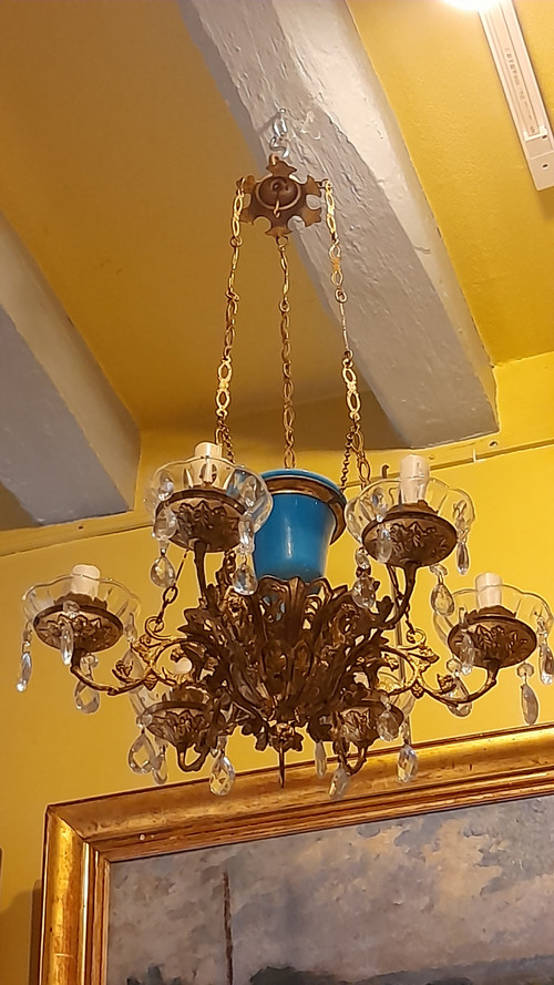 Brass alcove chandelier and blue opaline bowl