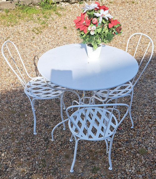 Salon de jardin trois chaises et une table des années 40 