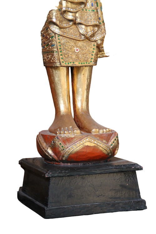 A large standing Buddha in gilded and inlaid wood, Thailand, 20th century 