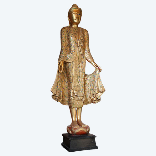 A large standing Buddha in gilded and inlaid wood, Thailand, 20th century 