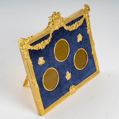 A Louis XVI style gilt bronze photo frame, late 19th century