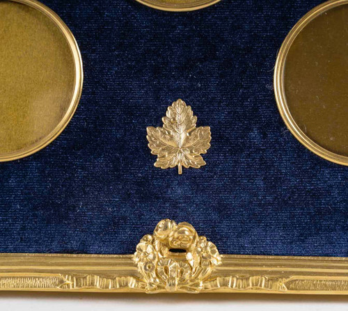 A Louis XVI style gilt bronze photo frame, late 19th century