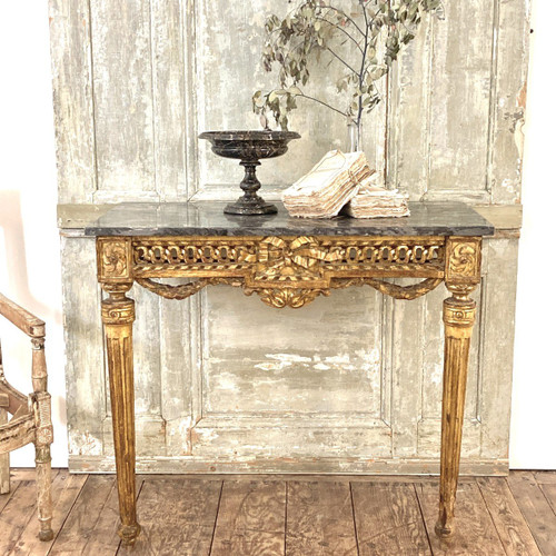 Louis XVI period console in gilded wood