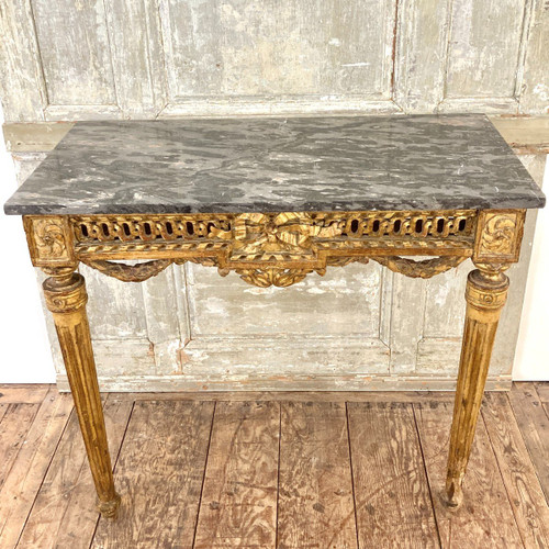 Louis XVI period console in gilded wood