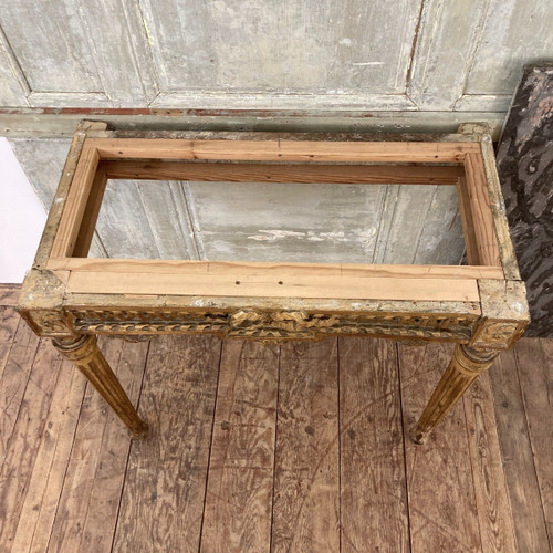 Louis XVI period console in gilded wood