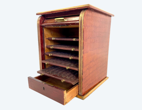 Antique cigar cabinet in mahogany and brass